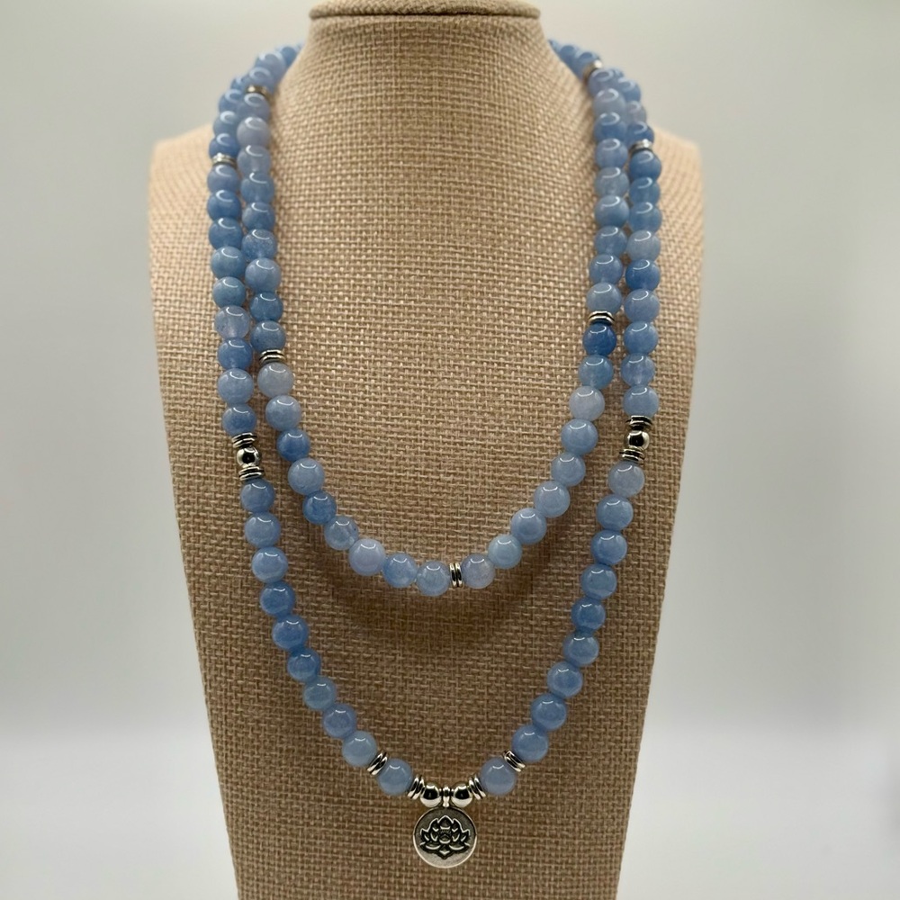 Elegant Blue Beaded Necklace with Silver Accents & Lotus Pendant
